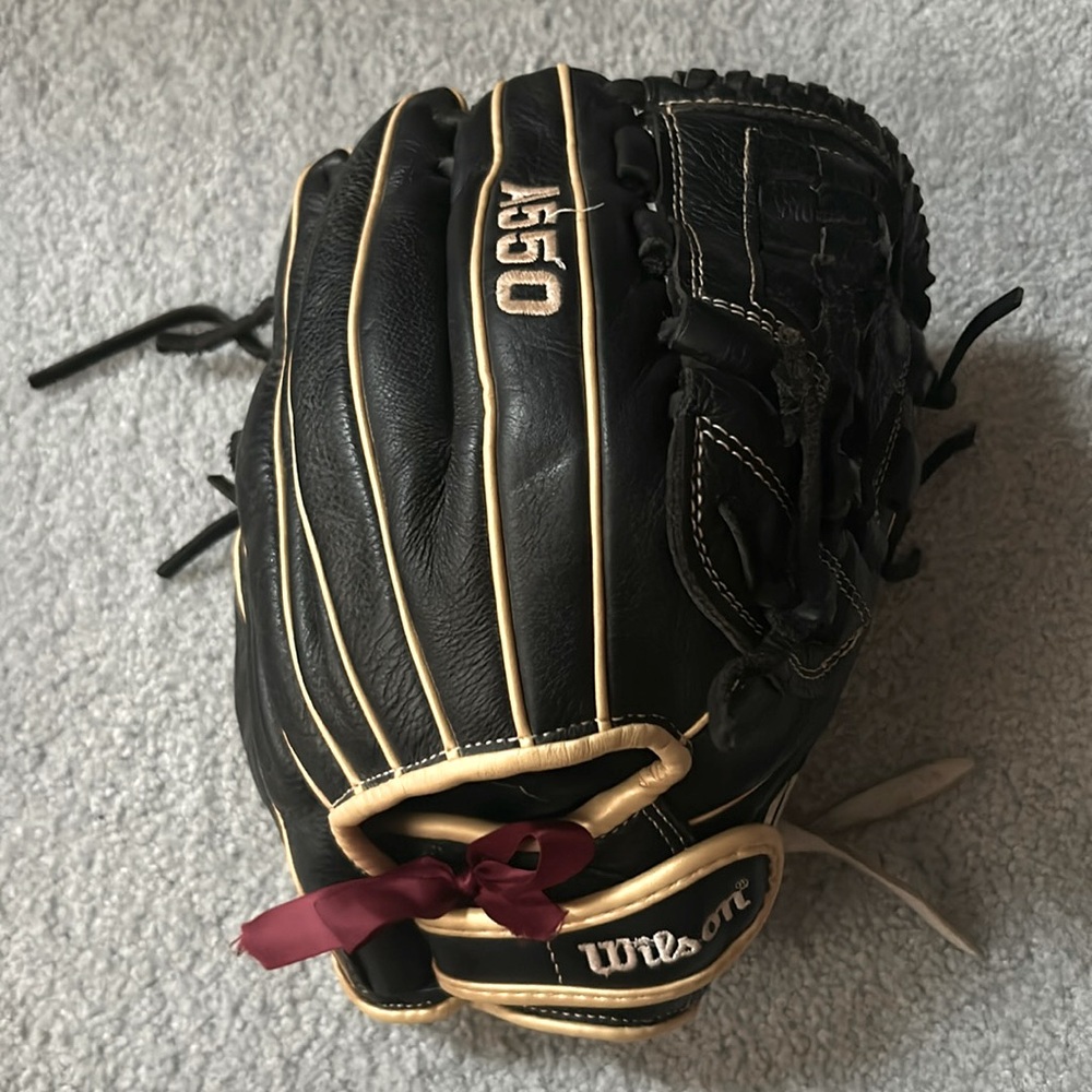 Black, gold, white wilson 12” softball glove